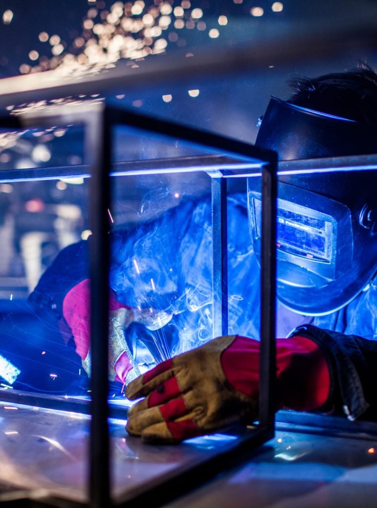 man welds at the factory. High quality photo